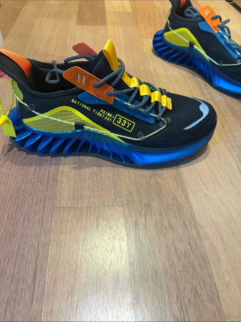 Men's Black Sneakers with Blue Sole and Yellow Accents